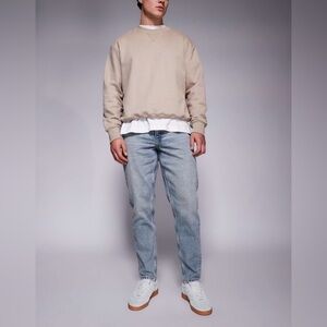 ASOS DESIGN tapered jeans in bleach wash